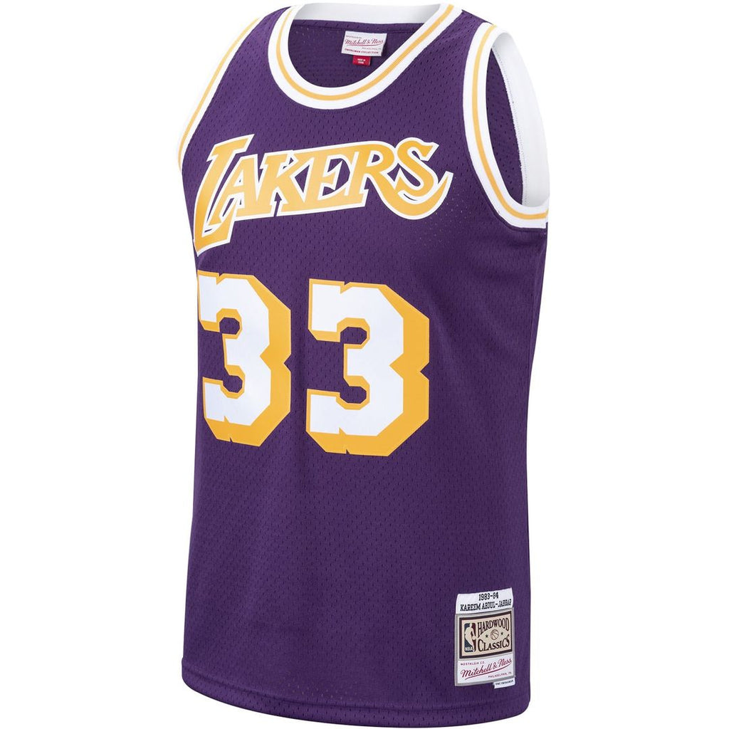 Kareem Abdul-Jabbar Los Angeles Lakers Mitchell & Ness Hardwood Classics Swingman Jersey - Purple | NBA Fan Gear