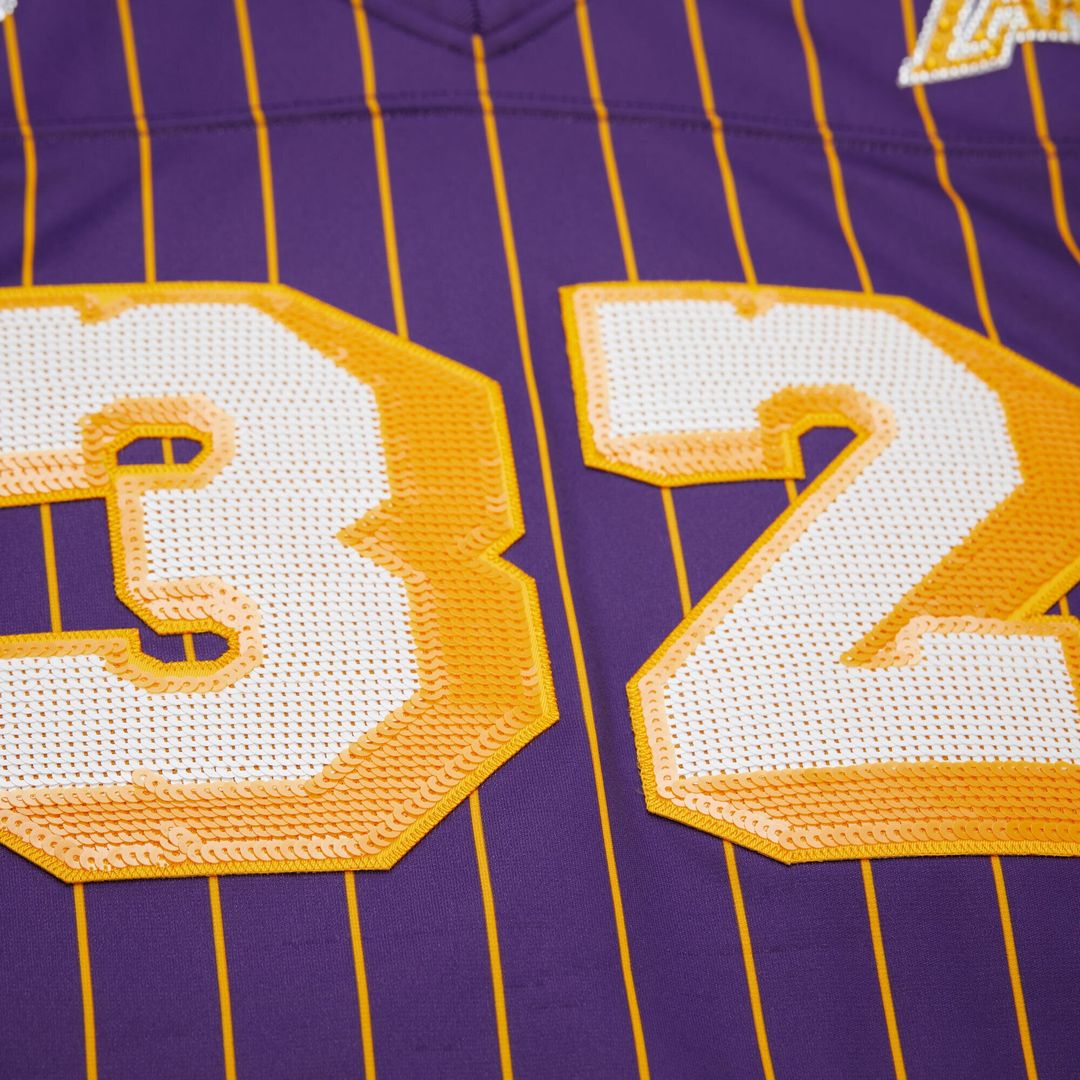 Magic Johnson Los Angeles Lakers Mitchell & Ness x DANNIJO Women's Cropped Football Fashion Jersey - Purple | NBA Fan Gear