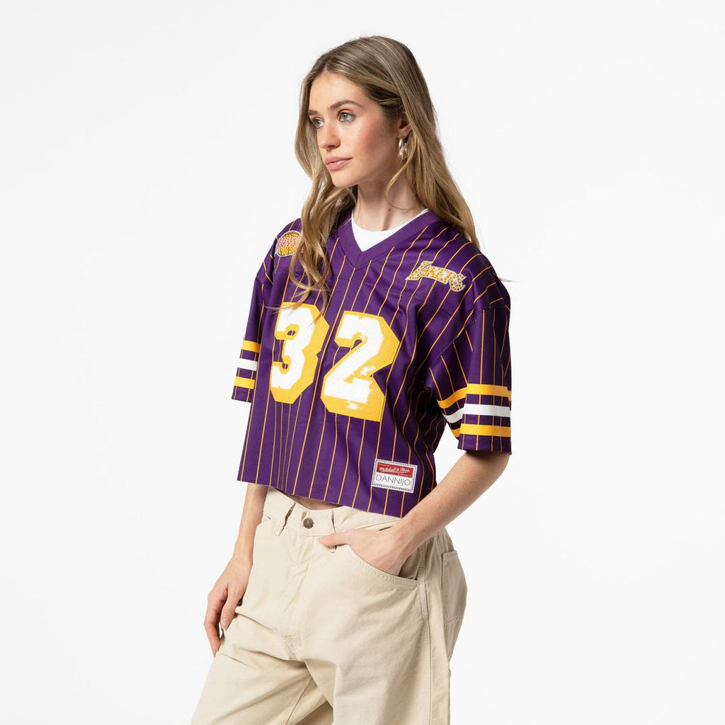 Magic Johnson Los Angeles Lakers Mitchell & Ness x DANNIJO Women's Cropped Football Fashion Jersey - Purple | NBA Fan Gear